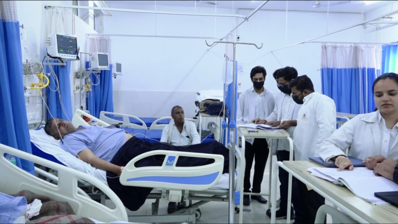 Doctors and resident students in a ward at SKS Hospital